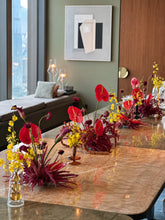 Load image into Gallery viewer, Carlyle &amp; Co. 生日長枱花藝佈置，紅掌、酒紅花穗與黃色小花沿雲石枱排列