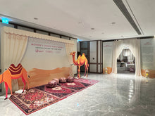 Load image into Gallery viewer, Mother’s Choice Family Benefit 沙漠主題拍照背景、駱駝造型及布幔入口現場全景